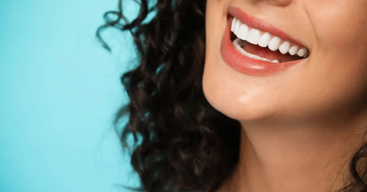 veneers-vs-bonding-cosmetic-options close up of porcelain veneers showing smooth natural looking smile